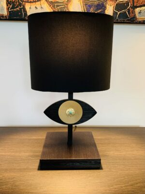 Lampe oeil noir et or